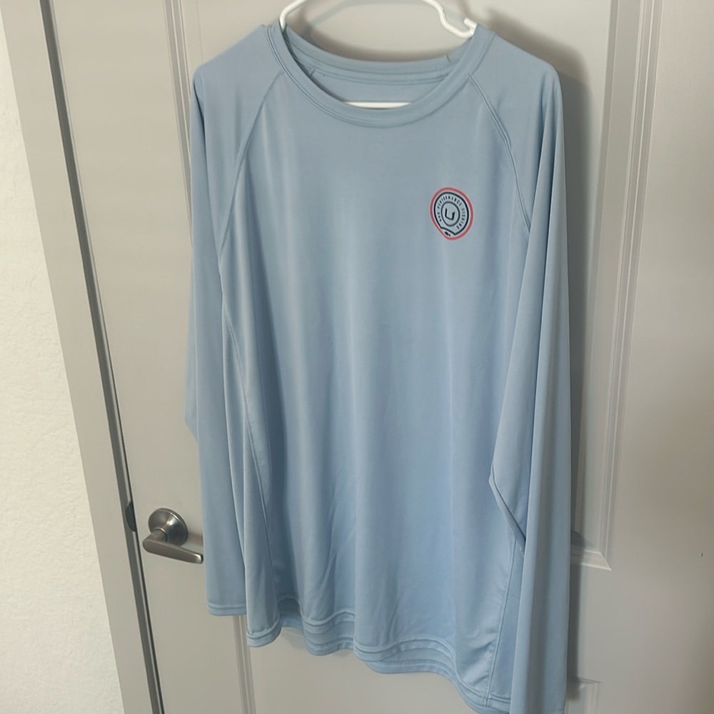 Huk shirt in blue. Size XXL. LIKE NEW